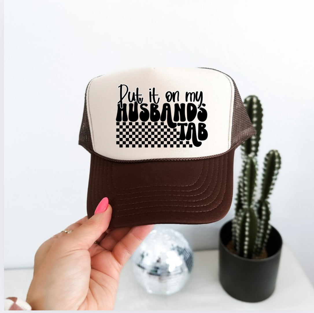 PUT IT ON MY HUSBAND’S TAB TRUCKER HAT