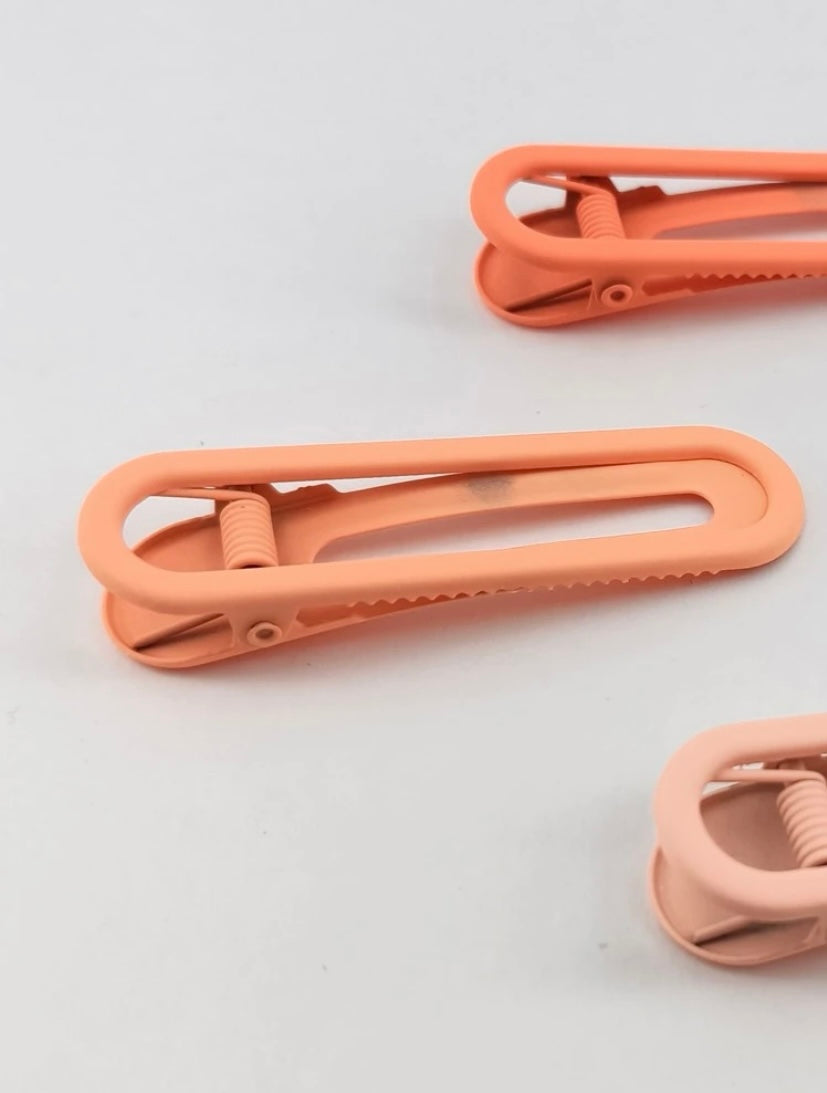 The Clancy Clips in Orange