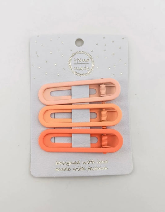 The Clancy Clips in Orange